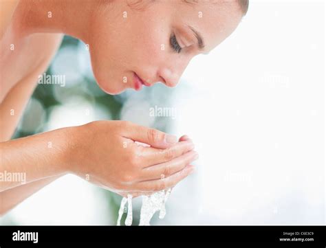 Woman Washing Face Stock Photo Alamy