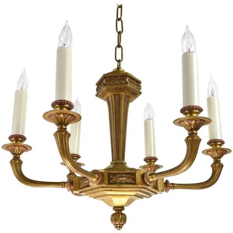 Well you're in luck, because here they come. Cast Brass Six Candle Chandelier at 1stDibs
