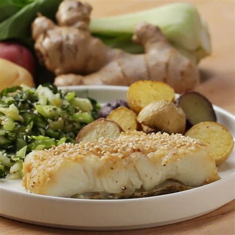 Miso Butter Seared Sea Bass With Roasted Vegetables Recipe By Tasty