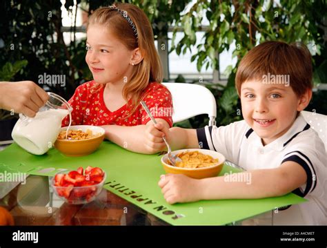Children Eating Breakfast Stock Photo Alamy