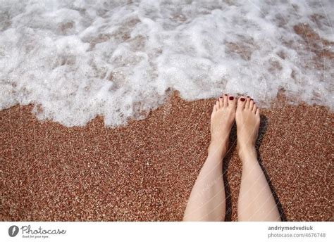Feet On Sand Barefoot Woman Walking On The Sandy Beach Closeup Of
