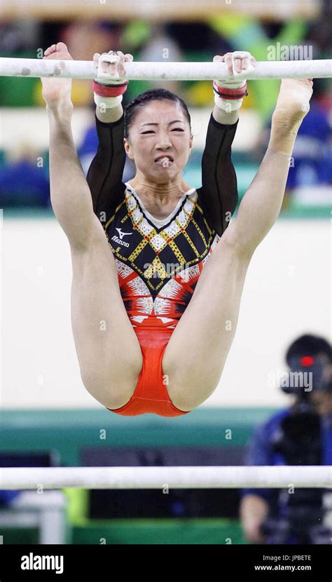 Japanese Gymnast Asuka Teramoto Performs On The Uneven Bars In The Women S All Around Final At