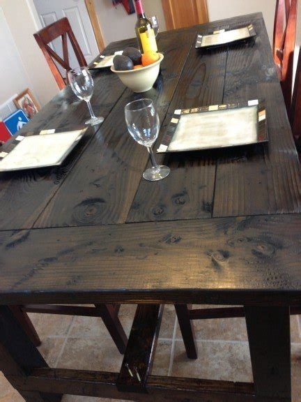 We focus the most on our youtube channel for instruction and tutorials, but if you're more of a reader, check out our blog! completed farm table dark finish - DIY Projects With Pete