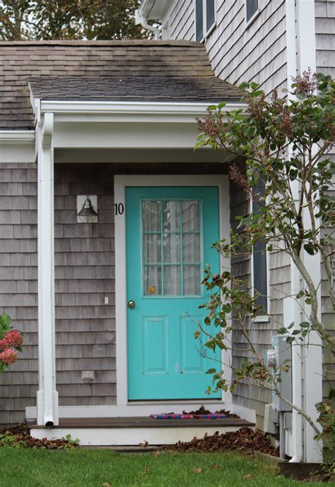 Love the symmetry of all details, love the oversized house numbers this fresh and happy turquoise blue color door might not be for everyone, but i am sure it makes the owners very happy! Seaside Cottage | Trends and Traditions