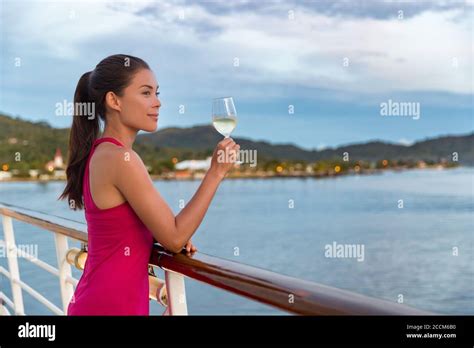 Luxury Cruise Ship Vacation Elegant Woman Drinking Glass Of Champagne At Dinner Enjoying Ocean