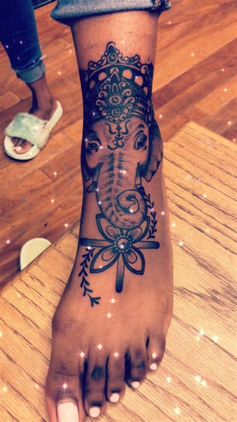 Blue small traditional flower tattoo on foot. girly foot tattoos #Foottattoos in 2020 | Stylist tattoos ...