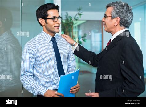 Boss Talking With His Employee In An Office Stock Photo Alamy