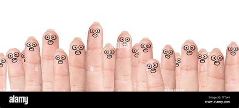 Many Fingers With Drawn Faces Stock Photo Alamy