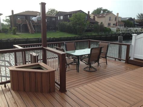 Trex decking reviews can be found all over the internet and it is time we add our thoughts into the mix. Trex Transcends Tropics Tiki Torch Decking