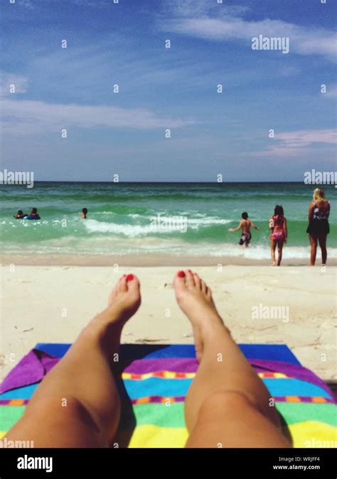 Woman Legs Beach Lying Hi Res Stock Photography And Images Alamy