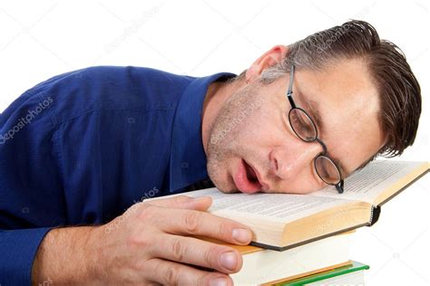 Male Nerdy Geek Fall Asleep With Face On Pile Of Books — Stock Photo