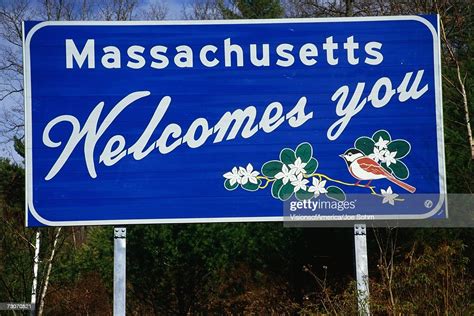 This Is A Road Sign That Says Massachusetts Welcomes You It Is Against