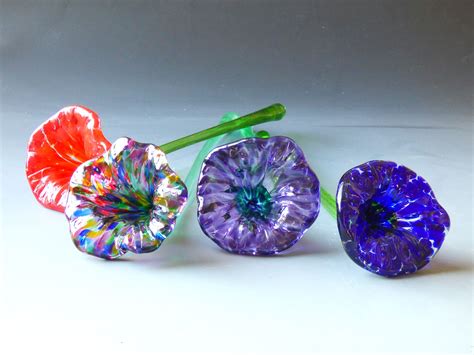 Choose from five popular flowers, and when the wax is gone, fill the. Glass Flowers | Glass flowers, Hand blown glass, Hand blown