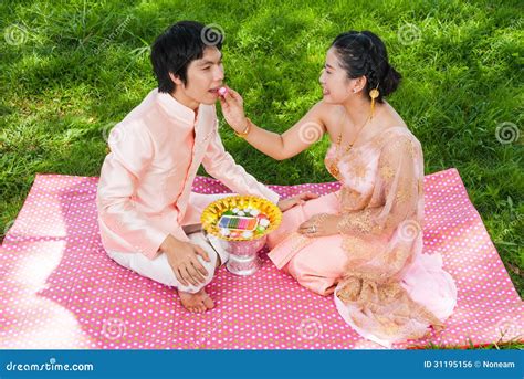 Asian Thai Bride Feeding Her Cute Groom Stock Photo Image Of Park