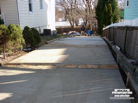 They can sink and rise, become stained and even break due to expansion and contraction. Driveways | Rocha Construction Silver Spring MD