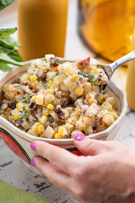 I usually leave the skins on when i make potato salad — i like the spots of color they add to the dish, plus they're thin enough that they're usually quite tender. Creamy Corn and Potato Salad with Buttermilk Dressing — The Mom 100