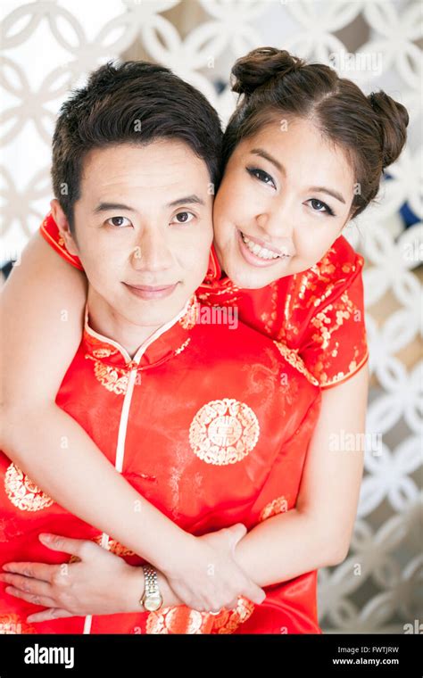Happy Young Couples With Chinese Dress Stock Photo Alamy