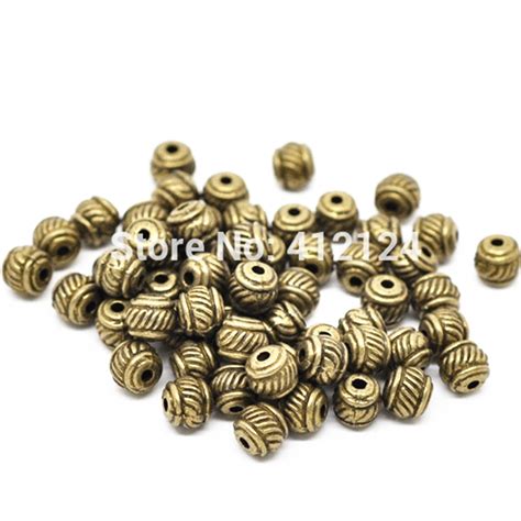 100pcs Spacer Beads Bronze Tone Round Carved Striped Metal Jewelry Diy