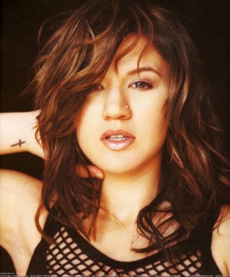 kelly clarkson s 14 tattoos and their meanings body art guru