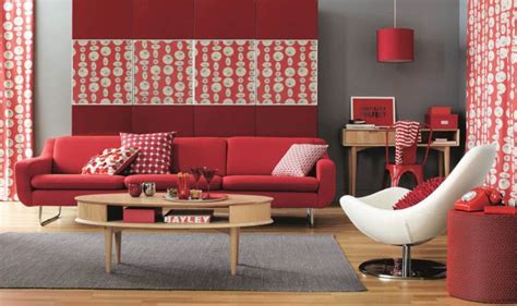 A Living Room With Red And White Decor