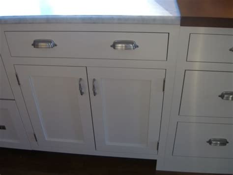 I gave the doors two coats of primer, sanding with a 120 grid sandpaper between coats. Inset Cabinets | Newsonair.org
