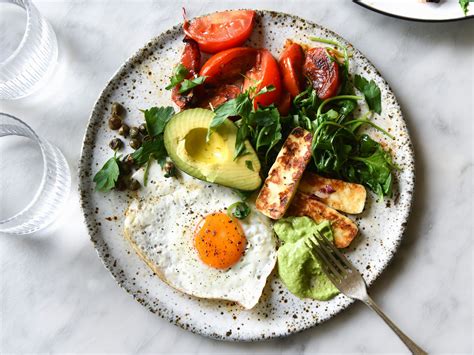 Hearty Breakfast With Fried Egg Avocado And Tomatoes Recipe Eat
