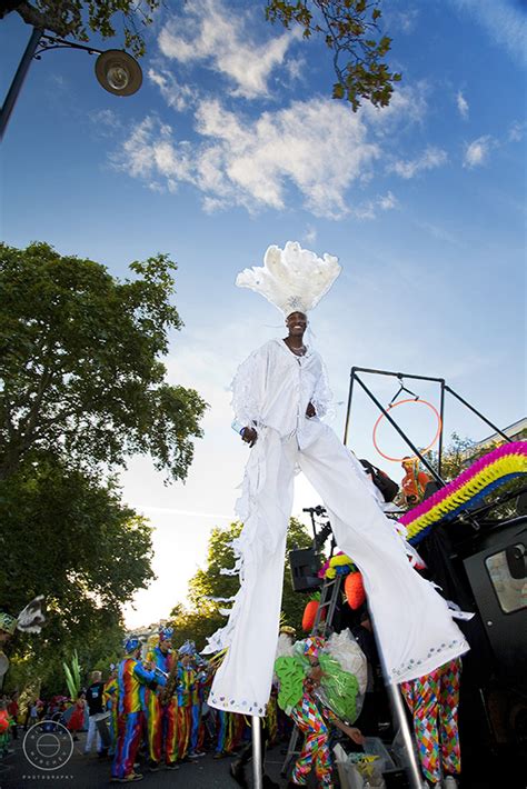 Man Walking On A Tall Stilts At Thames Carnival London