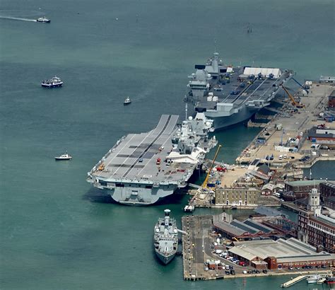 The Royal Navys Two Aircraft Carriers Face Each Other Alongside At
