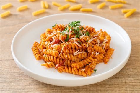 Premium Photo Spiral Or Spirali Pasta With Tomato Sauce And Cheese