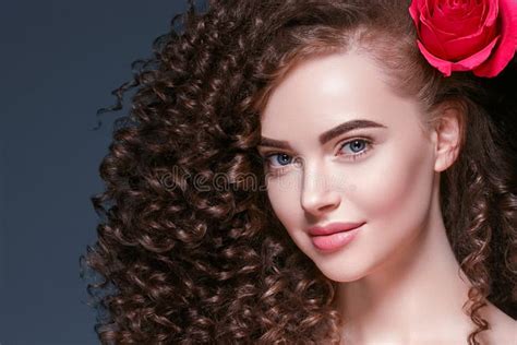 Beauty Woman With Rose Flower Beautiful Curly Hair And Lips Stock Image