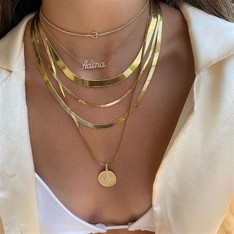 adina s jewels on instagram “liquid gold adinas” face jewellery body jewelry neon outfits
