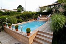 Terrasse en teck piscine - veranda-styledevie.fr
