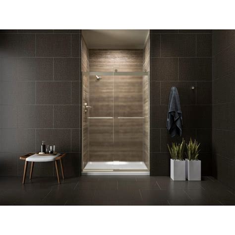 kohler levity 47 5 8 in x 74 in semi frameless sliding shower door in anodized brushed bronze