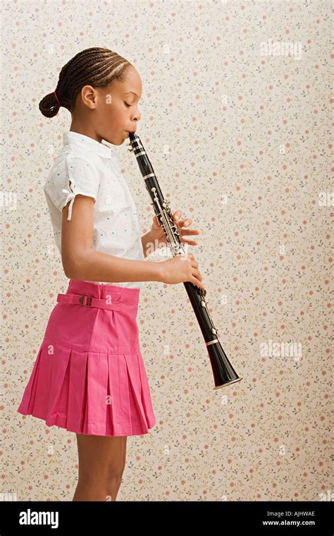 Girl Playing Clarinet Stock Photo Alamy