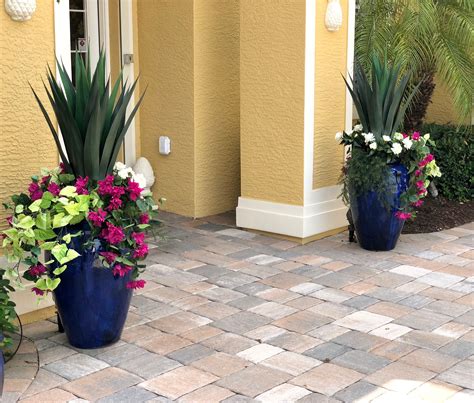 I resorted to planting fake flowers outside and was shocked by how pretty they looked! A closer look at the Florida entryway plantings. These ...