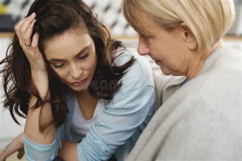 Close Up Of Mother Comforts Her Sad Daughter Stock Photo Image Of