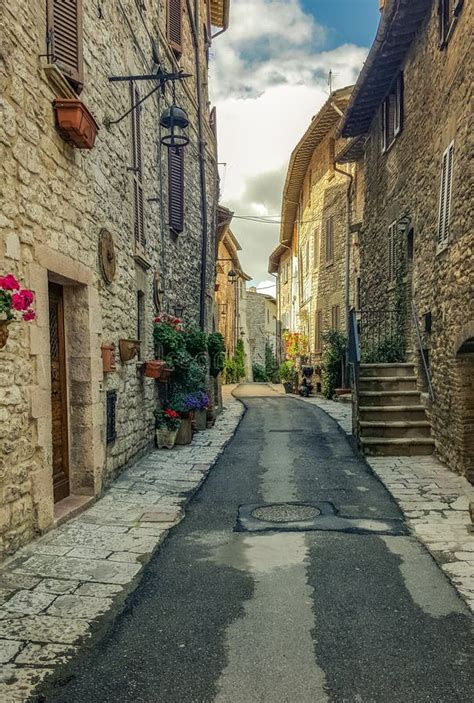 streets and beautiful buildings in medieval city of assisi umbria italy editorial image image