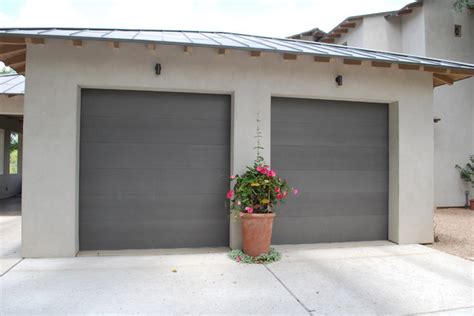 Learn how to paint your garage door the right way, giving the exterior of your home an upgrade. Cowart Door - Paint Grip Clad Garage Doors - Modern ...