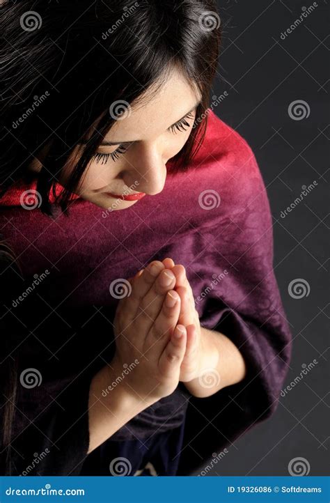 A Women Is Praying To God On The Mountain Praying Hands With Faith In