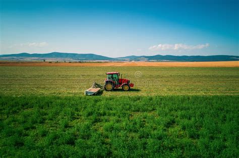 Tractor Mowing Green Field Stock Image Image Of Nature 163582255