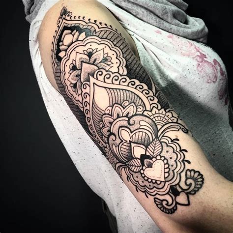 Henna Style Upper Arm Tattoo On The Right Upper Arm