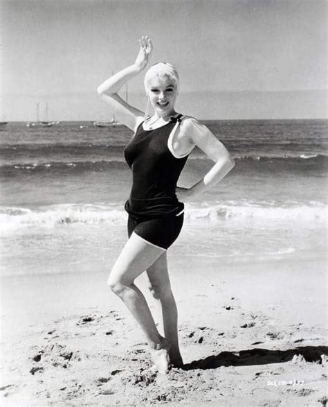 Candid Photographs Of Marilyn Monroe In Black Swimsuit From The