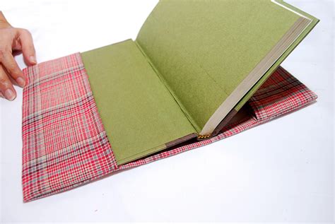 Sew A Fabric Book Cover Add Handles To Both Sidesand Elastic On Both