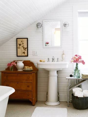 Make the most of the unique shape of your attic by working with the original features: Attic Bathroom Sloped Ceiling Design Ideas