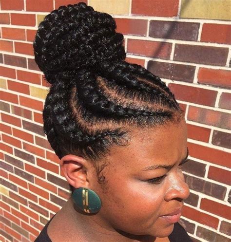This hairstyle suits oval faced women. African American Braided Bun #braidsforblackwomen | Braids ...