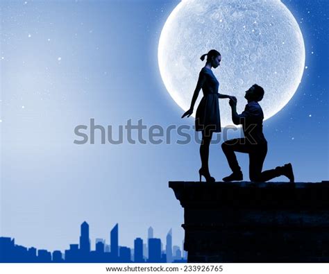 Silhouettes Romantic Couple Under Moon Light Stock Photo