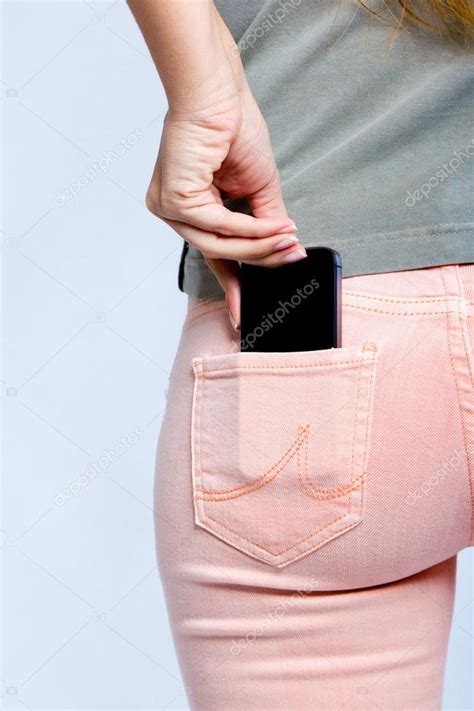 Black Smartphone In Back Pocket Of Girls Jeans Stock Photo By ©nenetus