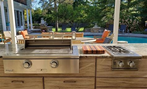 A diy outdoor kitchen with a kitchen island can be customized to fit any space. 4 Essential Tips on How to Build Your Own Outdoor Kitchen