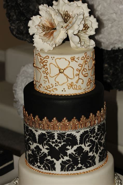 Inside, the cake features flavors of chocolate, salted caramel, and raspberry cream. Wedding Cake Black&white Silver-Gold - CakeCentral.com