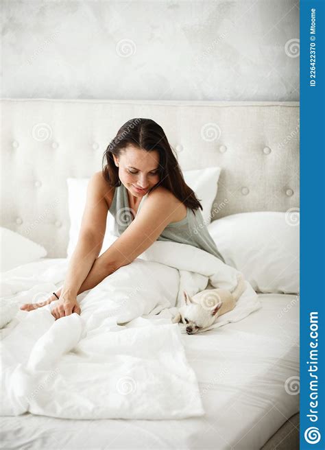 Lazy Morning Concept Beautiful Happy Woman Wakes Up In Bed And